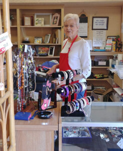 Pauline at the cash register